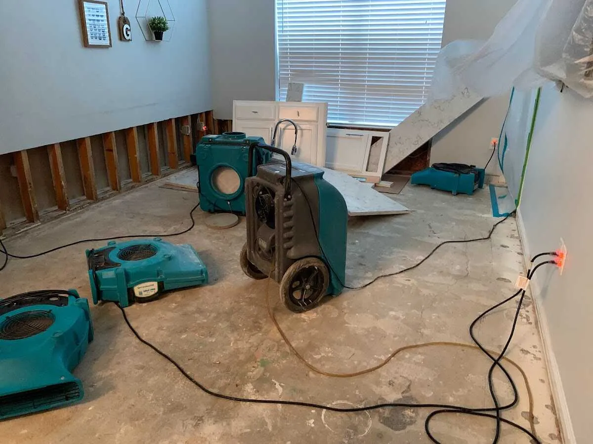 Dehumidifier in flood-cut room for Water Damage Restoration in Ewing