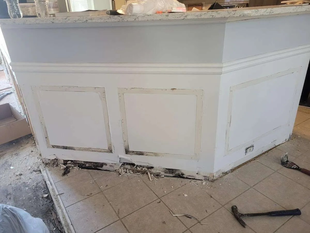 Water damage and mold on kitchen during Storm Damage Restoration in Ewing